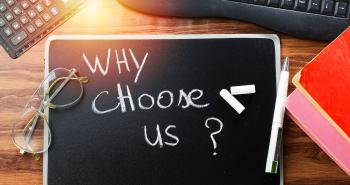 Blackboard with text Why Choose Us