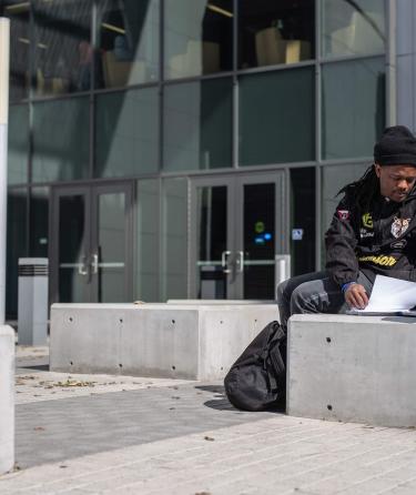 Student Outside in Computer