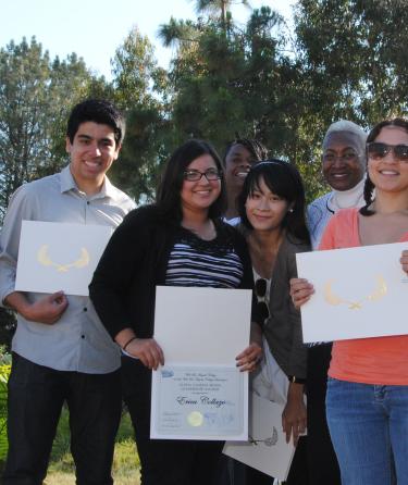 Group of Students with Diplomas