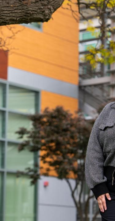 Young female standing on college campus