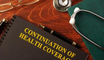 Continuation of Health Coverage text on notebook cover