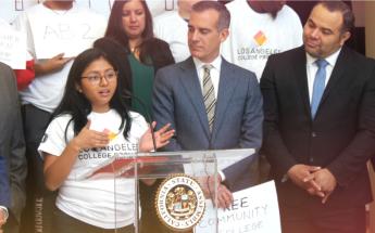 photo image of young female student speaking at podium