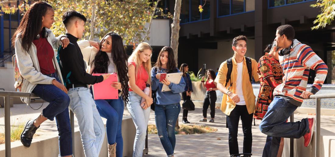 Girls Students Graduate Walking on Campus