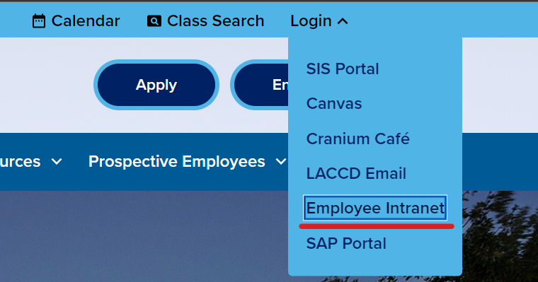 "Login" dropdown menu with "Employee Intranet" highlighted