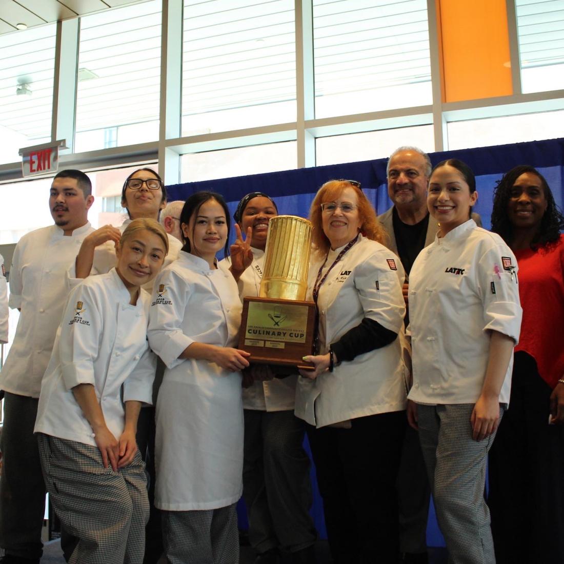 LATTC’s winning team pictured with President Kathleen Burke, Chancellor Francisco Rodriguez, and LACCD Trustee Nichelle Henderson and the coveted Golden Chef’s Hat trophy. 