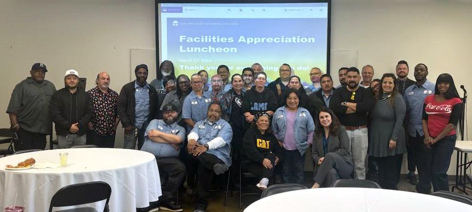 A large group photo of LAMC Facilities staff with college administration