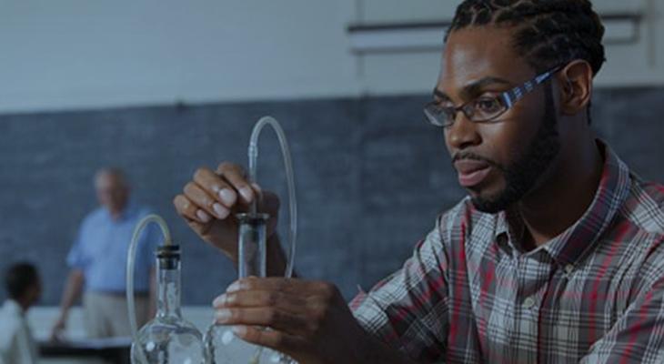 Male student in Science lab