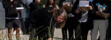  Associate professor Vered Mirmovitch, front, leads students on a plant tour on the West Los Angeles College campus, March 12, 2024. As students consider jobs that play a role in solving the climate crisis, community colleges are responding. 