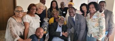 Dr. Anthony Culpepper (4th from right in the grey suit)