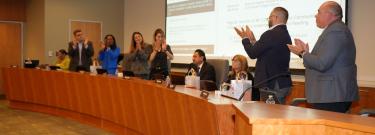 Board of Trustees applauding Chancellor's Román appointment as permanent Chancellor