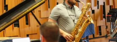Owen Richards playing the saxophone