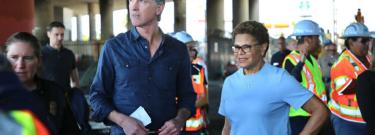 California Gov. Gavin Newsom and Los Angeles Mayor Karen Bass review damage to the I-10 freeway on Nov. 12, 2023 after a major fire under the highway.
