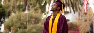 ASU graduate Byron Roberson poses for a photo outside the ASU California Grand Center in downtown Los Angeles last fall. Photo by Samantha Chow/ASU