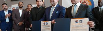 Chancellor Rodriguez and Superintendent Carvalho holding partnership agreement