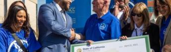Asm. Isaac Bryan shakes hands with Dr. James Limbaugh