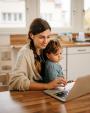 Young Woman and Little Girl on Laptop